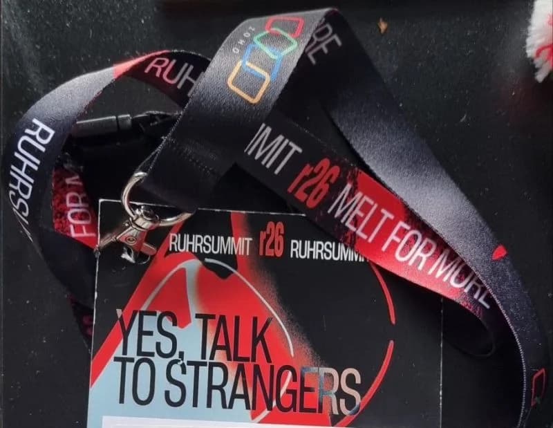 r26 lanyard and attendee badge with the QR code excluded